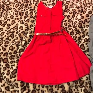 I’m selling a red dress with a golden belt